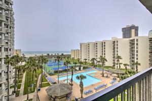 a view of a resort with a pool and the ocean at Inviting South Padre Island Condo with Beach Views! in South Padre Island