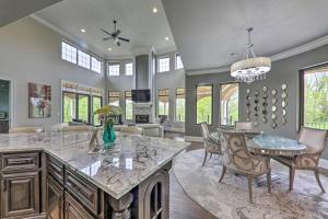 a kitchen and living room with a table and chairs at Huge Lebanon Estate with Resort-Style Amenities in Lebanon