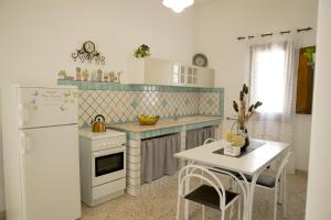 Kuhinja ili čajna kuhinja u objektu Appartamento Savoia 46