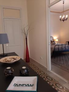 Posteľ alebo postele v izbe v ubytovaní "RUNFULÌA" Deluxe apartment
