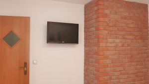 TV a/nebo společenská místnost v ubytování DAWIDEK