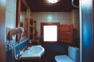 Kylpyhuone majoituspaikassa Artesola