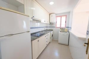 Kuchyň nebo kuchyňský kout v ubytování Apartamentos Nuevo México C 372