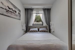Posteľ alebo postele v izbe v ubytovaní Luxury Promajna Beach Apartment