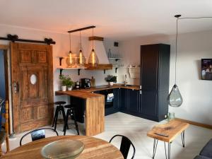 Kuchyňa alebo kuchynka v ubytovaní Apartament Komorowskiego