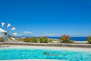 The swimming pool at or close to Windmill Villas