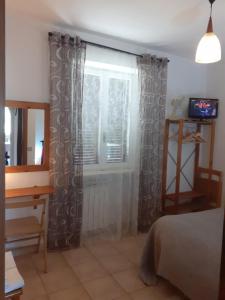 Postel nebo postele na pokoji v ubytování Life B&B