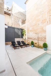 Bazén v ubytovaní Bordoy Mostatxins - Hotel Boutique Adults Only alebo v jeho blízkosti