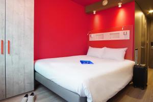 Postel nebo postele na pokoji v ubytování ibis budget Bogota Marly