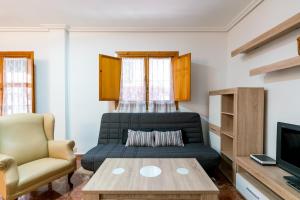 TV a/nebo společenská místnost v ubytování Holi-Rent Estrella