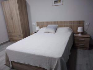 Postel nebo postele na pokoji v ubytování Casa Inocencio