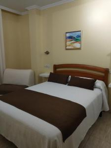 
Cama o camas de una habitación en Hostal Stella Del Mare
