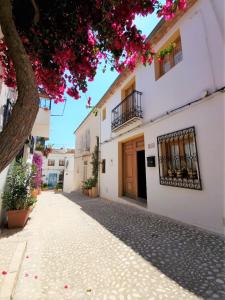 a street in the town of antiparos in antiparos island at Casa en Bellaguarda by NRAS in Altea +64 photos