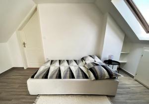 Cama o camas de una habitación en Andrea Apartmanok