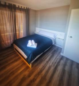 Postel nebo postele na pokoji v ubytování Primera línea Morro de Goss
