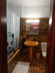 Een badkamer bij 1 Zimmer Apartment mit Seesicht und Pool