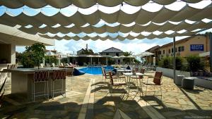 The swimming pool at or close to Seaside Suites
