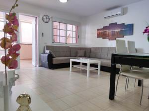 A seating area at Los Cristianos - heated swimming pool air-conditioned