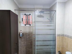 A bathroom at Los Cristianos - heated swimming pool air-conditioned