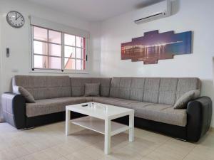 A seating area at Los Cristianos - heated swimming pool air-conditioned