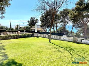 Ein Garten an der Unterkunft APARTBEACH CYE 6 CLIMATIZADO y JUNTO PLAYA