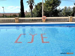 Der Swimmingpool an oder in der Nähe von APARTBEACH CYE 6 CLIMATIZADO y JUNTO PLAYA