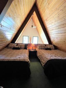 A bed or beds in a room at Mittenwald