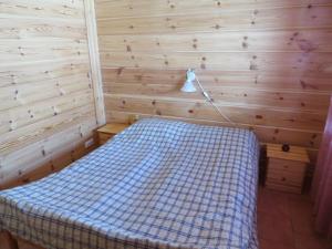 A bed or beds in a room at Arctic Polar Holiday Village