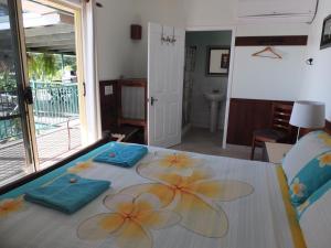 Voodi või voodid majutusasutuse Daintree Riverview Lodges toas