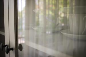 a close up of a window with a bowl at Šaulys in Druskininkai