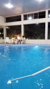 Swimming pool sa o malapit sa Complejo Turistico Chuy
