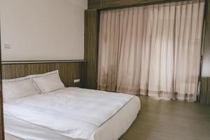 归宿 Destination Inn客房内的一张或多张床位