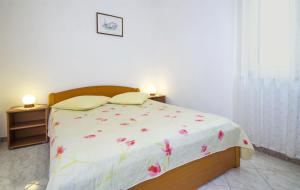Postel nebo postele na pokoji v ubytování Apartments Iris