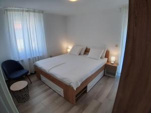 Postel nebo postele na pokoji v ubytování Apartment Nikolina