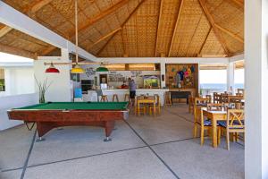 a pool table in the middle of a restaurant at Dive Spot Asia Beach Resort in Boljoon