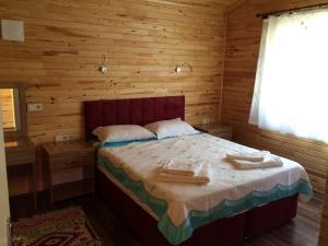 מיטה או מיטות בחדר ב-Azra Villas