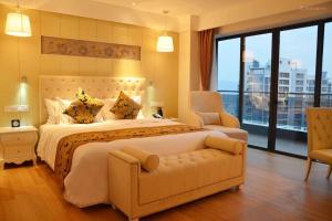 Ένα ή περισσότερα κρεβάτια σε δωμάτιο στο Wyndham Garden Lingshui