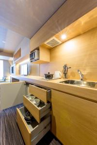 A cozinha ou cozinha compacta de ORI Kyoto