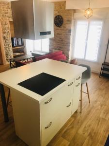 Postel nebo postele na pokoji v ubytování Le Salon de l'Isle