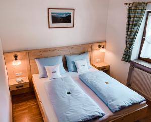 Postel nebo postele na pokoji v ubytování Haus am Balsberg