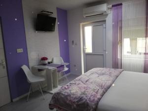 Posteľ alebo postele v izbe v ubytovaní Apartments Benic