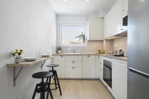 Kuchyň nebo kuchyňský kout v ubytování Apartment Leonor