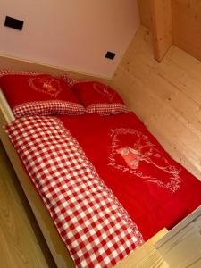 Letto o letti in una camera di Almchalet Hüttenzauber