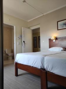 Postel nebo postele na pokoji v ubytování Hotel Sao Mamede Estoril