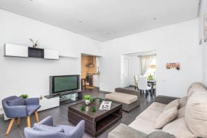 Μια τηλεόραση ή/και κέντρο ψυχαγωγίας στο Villa Quimera by Villa Plus