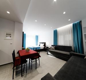 Posezení v ubytování Athena Center Apartments