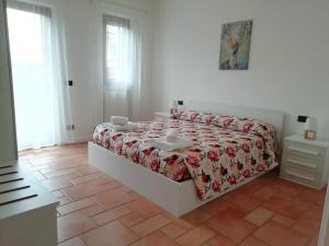 Un pat sau paturi într-o cameră la Re Lear Al Lago +35 fotografii