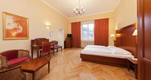 Postel nebo postele na pokoji v ubytování Hotel Marienhof