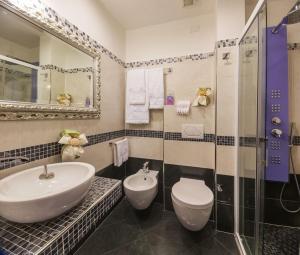Koupelna v ubytování Hotel Petronio
