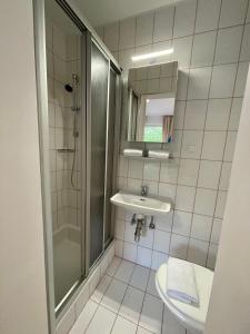 Kúpeľňa v ubytovaní Pension Rohrer am Murradweg - Ehrenhausen an der Weinstrasse